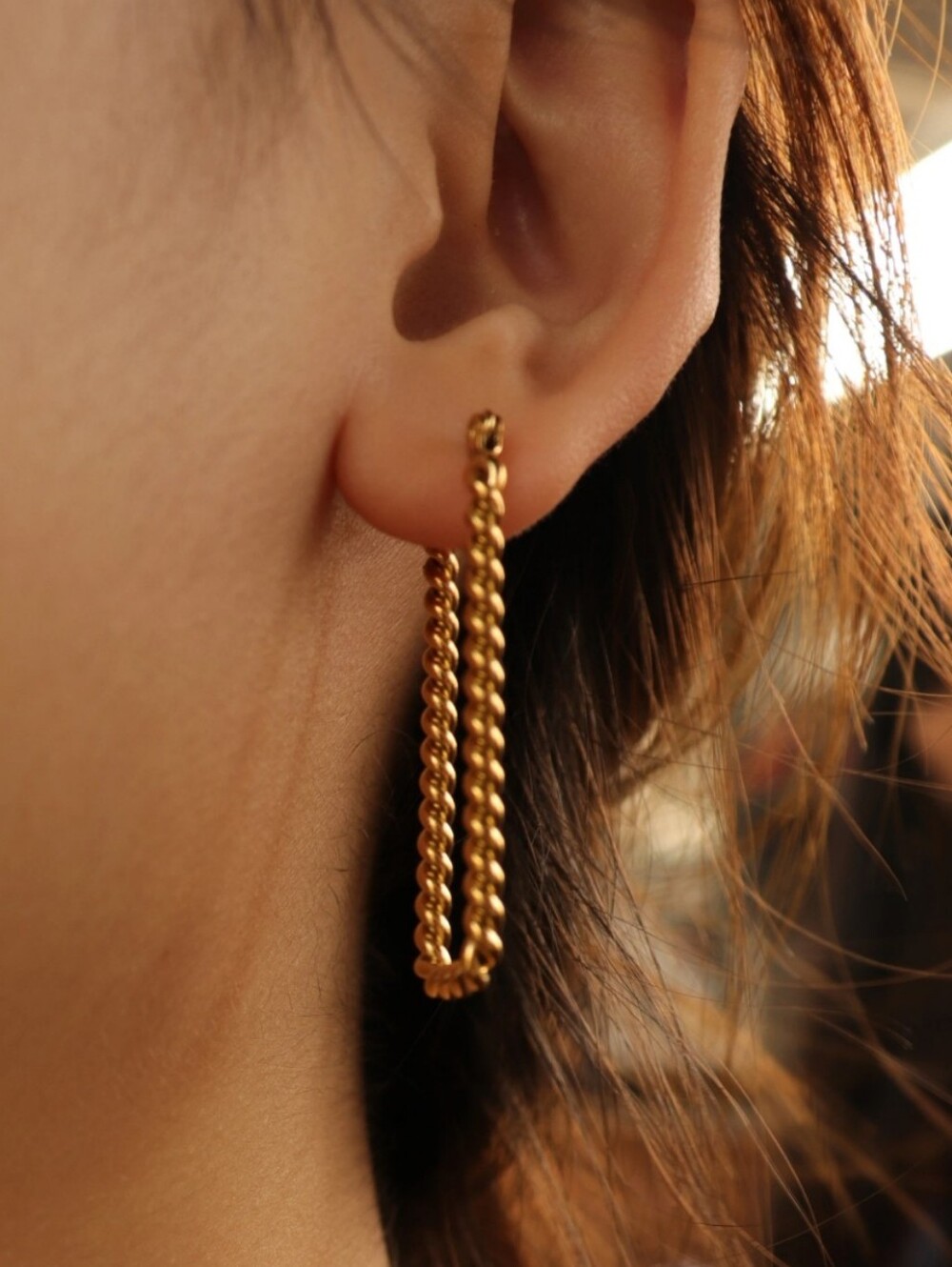 Gold plated twisted long rectangular hoop earrings; 1.96"x.59"; nwot